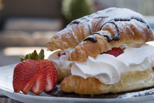 Closeup of a gourmet strawberry croissant