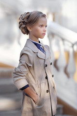 portrait of little girl outdoors in autumn