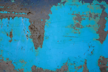Texture of rusty iron sheet. colored background of rusty metal surface with a navy blue paint peeling and cracking texture