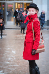 Girl in a red coat