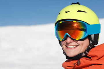 portrait of a snowboarder on the top of Dolomiti Alps