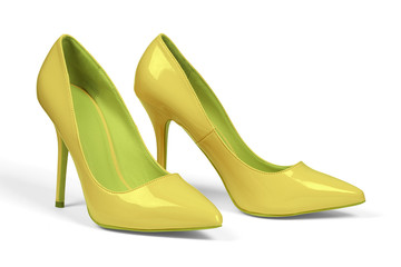 A pair of yellow women's heel shoes isolated over white with clipping path.