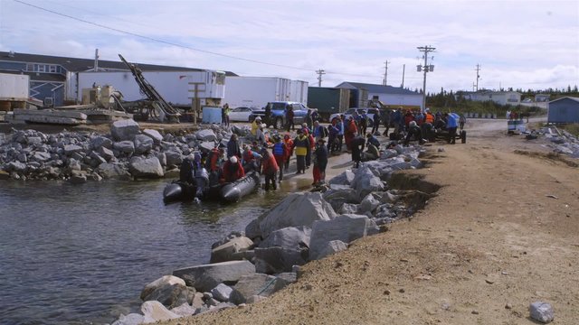 Time-lapse of expeditioners loading in to a zodiac boat in Kangiqsualujjuaq George River.