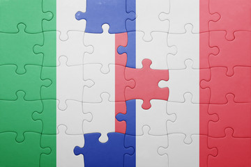 puzzle with the national flag of italy and france