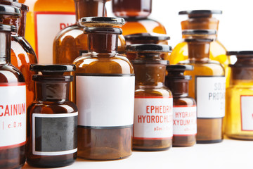 medicine bottle with blank label in pharmacy