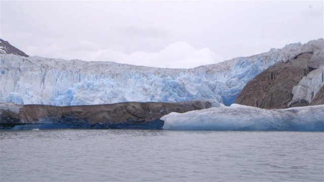 Glacier in Greenland on an overcast day. Slow Motion