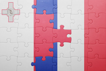 puzzle with the national flag of malta and france