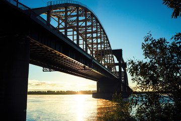 bridge  panoramic view at sunrise with warm sun light blue sky