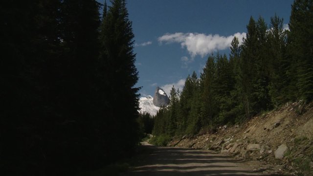 Dirt road leading to the Bugaboo Mountains, British Columbia. Zoom