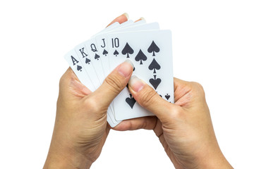 Playing cards in hand isolated on white background
