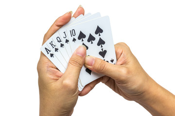 Playing cards in hand isolated on white background