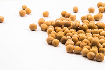 dried yellow peas on white