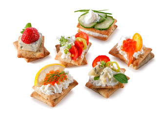 set of gourmet crackers snacks close-up isolated on white background
