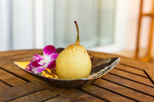 Pair And Pink Orchid In The Bowl On The Lath Table, Pair Fruit