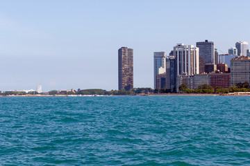 Fototapeta na wymiar Color DSLR image of Chicago city skyline, as seen from beach along North Michigan; horizontal with copy space for text