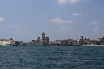 Naklejka premium Medieval stone castle in Sirmione on lake Garda near Verona, Italy 