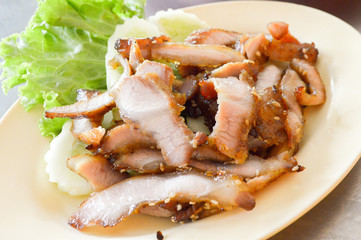 Charcoalboiled pork neck Thailand food
