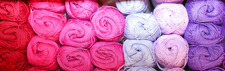 purple soft balls of colored wool