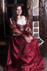 Portrait of elegant woman in medieval era dress