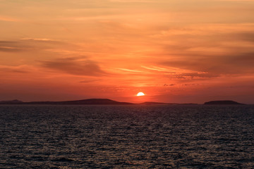 Beautiful sunset on the sea, Naxos island, Cyclades, Greece.
