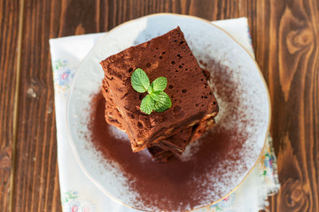 Cake chocolate brownies on wooden background