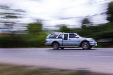 pick-up Speeding in road