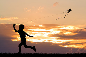 child with kite - obrazy, fototapety, plakaty