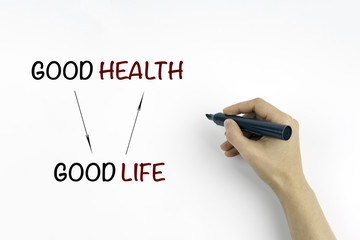 Hand with marker writing the text - Good Health and Good Life