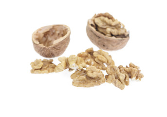Cracked walnut isolated on white background