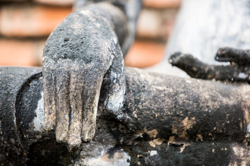 Hand of an ancient Buddha image at Sukhothai historical park, Th