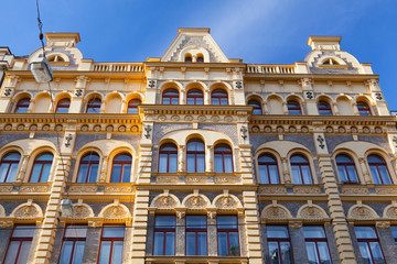Fototapeta na wymiar Detail of amazing facade of traditional building in Prague