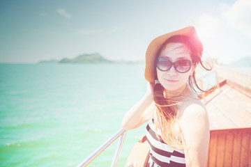 Asian woman wearing sunglasses outdoors portrait with sunny day.