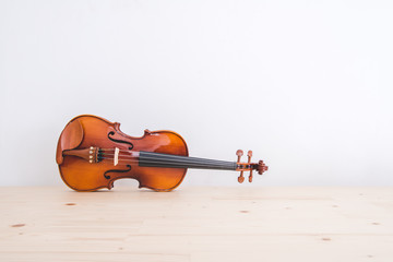 violin on pine wood table with copyspace.
