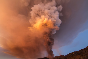 Volcano eruption. Mount Etna erupting from the crater Voragine