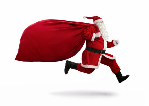 Santa Claus running to delivery christmas gifts isolated on white
