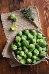 Fresh green broccoli over old wood table