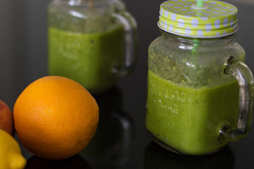 Fresh smoothie and orange