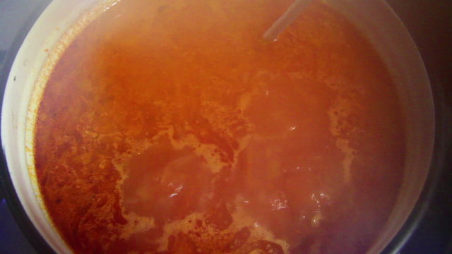 Stove top with pan of russian borsch