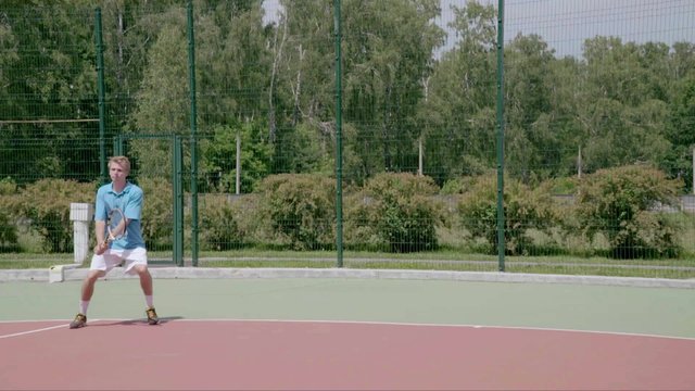Two-Handed Backhand from the right court's coner. Powerfull tennis shot. Slow Motion