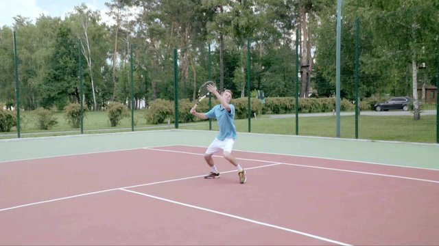 Tennis overhead smash. Most graceful and powerful stroke. Slow motion