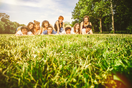 Group of Friends on the Grass at the Park