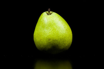 Fototapeta na wymiar Pear on Dark Background