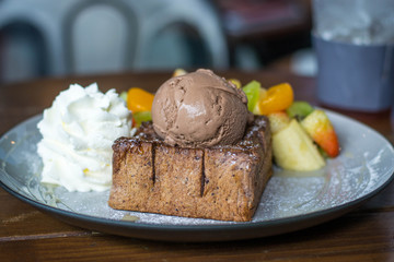 Ice cream and fruit salad almond toast bread