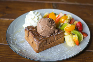 Ice cream and fruit salad almond toast bread