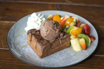 Ice cream and fruit salad almond toast bread