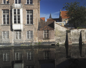 Fototapeta na wymiar Brugge Bruges Belgium medieval buildings canal made of brick an