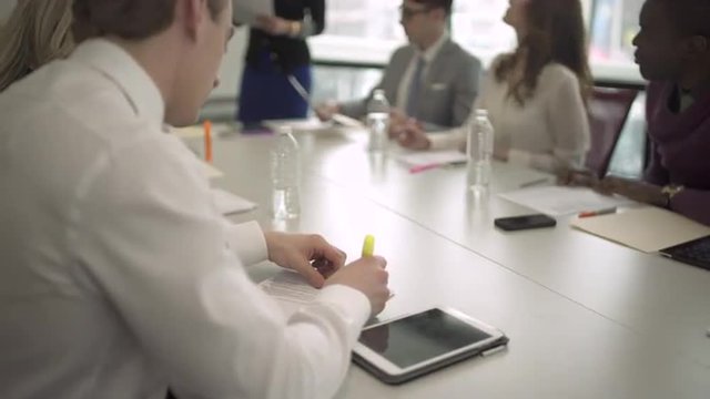 Group of attractive professionals involved in meeting