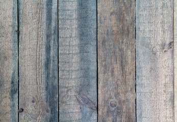 Old burned wooden fence. Backgrounds and textures