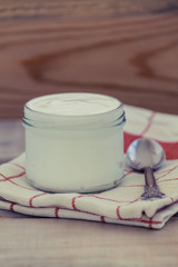 Greek Yogurt on a vintage wood background