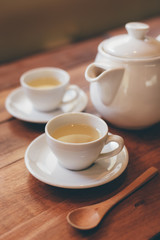 cup of tea on the wood desk